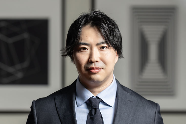 王 健